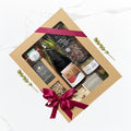 Gluten Free Hamper by Geelong Hampers featuring local Geelong wine, gluten-free crackers, pistachios, tomato relish, almond and cherry rocky road, spiced pistachio dukkah with same-day delivery across Geelong.