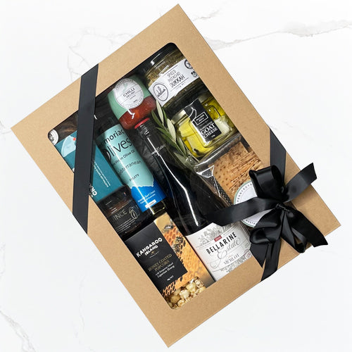 Harvest hamper with Bellarine Estate Julien’s Merlot, Meredith goat’s cheese, olive oil, pita crisps, chilli relish, pistachio dukkah, quince paste, artisan crackers and honey popcorn Geelong delivery