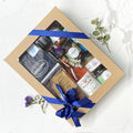 The Local Geelong hamper featuring Bellarine Estate First Blush Rosé, Pennyroyal pita crisps, capsicum relish, Otway honey, Geelong Coffee Roasters coffee, Mount Moriac olive oil, Adelia Bellarine brownies, raspberry preserve, pistachio dukkha and Lovecraft soy candle