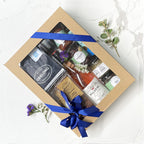 The Local Geelong hamper featuring Bellarine Estate First Blush Rosé, Pennyroyal pita crisps, capsicum relish, Otway honey, Geelong Coffee Roasters coffee, Mount Moriac olive oil, Adelia Bellarine brownies, raspberry preserve, pistachio dukkha and Lovecraft soy candle